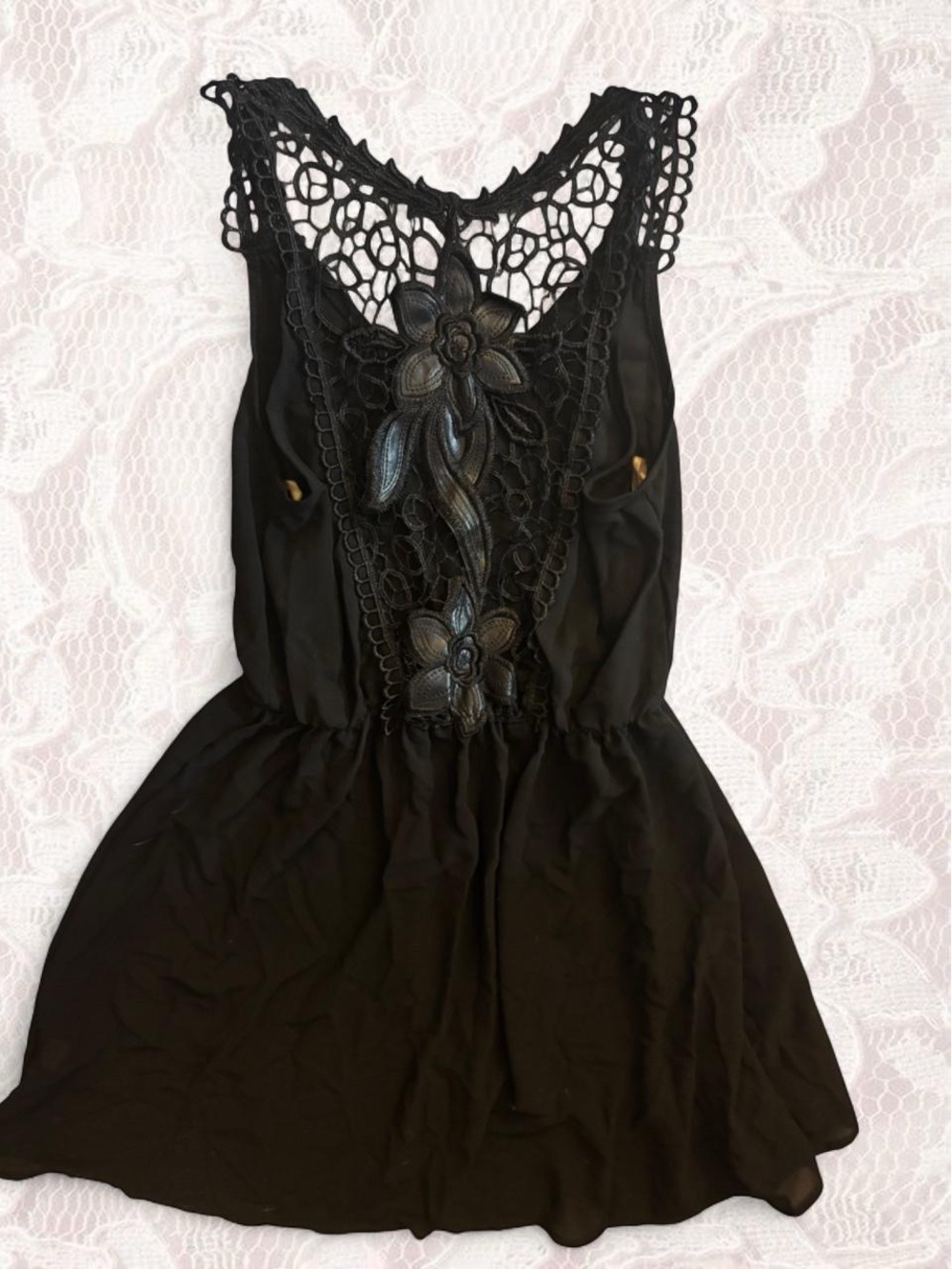 Black mini babydoll dress with crochet floral back